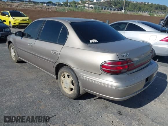 ✅ 1999 Oldsmobile Cutlass GL • VIN: 1G3NB52M9X6313424 • Lot: 42345276. Listed on IAAI with 191,527 mi. Free auction sales archive from the USA and detailed vehicle history report at DreamBid. Image 3.