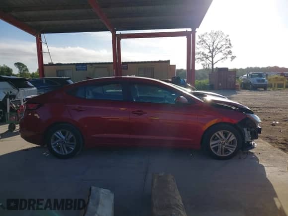 ✅ 2020 Hyundai Elantra SEL • VIN: 5NPD84LF0LH510244 • Lot: 43378041. Listed on IAAI with 92,409 mi miles. Access the free auction sales archive from the USA and view a detailed vehicle history report at DreamBid. Image 13.