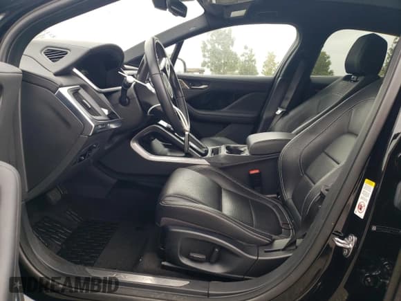 ✅ 2020 Jaguar I-Pace SE • VIN: SADHC2S12L1F79008 • Lot: 55569504. Wystawiony na Copart z przebiegiem 46 948 mil. Bezpłatny archiwum sprzedaży aukcyjnych z USA i szczegółowy raport historii pojazdu na DreamBid. Zdjęcie 7.