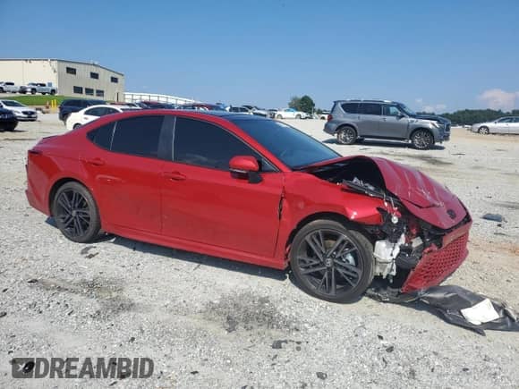 2025 Toyota Camry LE with VIN 4T1DAACK4SU088348, listed as a Copart auction lot 68684105 with 28,061 mi miles and Salvage title. Bid and sale history available at DreamBid. Image 4.