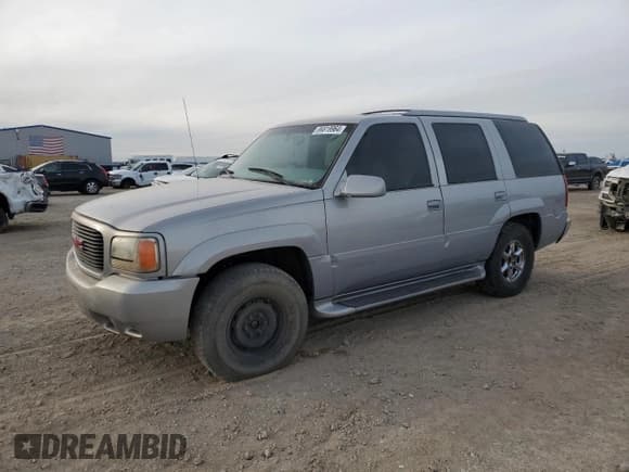 ✅ 2000 GMC Denali • VIN: 1GKEK63R9YR225073 • Lot: 86819964. Listed on Copart with 207,827 mi. Free auction sales archive from the USA and detailed vehicle history report at DreamBid. Image 1.