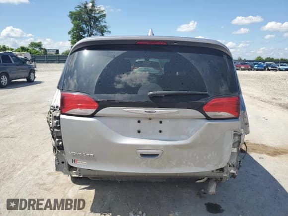 ✅ 2020 Chrysler Voyager LX • VIN: 2C4RC1CG8LR210028 • Лот: 61841675. Опубликован ранее на Copart с пробегом 58 079 миль. Бесплатный доступ к архиву аукционных продаж из США и подробный отчёт об истории автомобиля на DreamBid. Изображение 6.