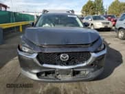 ✅ 2021 Mazda CX-30 Premium • VIN: 3MVDMBDL8MM315717 • Lot: 89928435. Wystawiony na Copart z przebiegiem 53 398 mil. Bezpłatny archiwum sprzedaży aukcyjnych z USA i szczegółowy raport historii pojazdu na DreamBid. Zdjęcie 5.