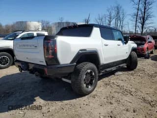 ✅ 2022 GMC HUMMER EV • VIN: 1GT40FDAXNU100033 • Lot: 50089115. Wystawiony na Copart z przebiegiem 3 866 mil. Bezpłatny archiwum sprzedaży aukcyjnych z USA i szczegółowy raport historii pojazdu na DreamBid. Zdjęcie 3.