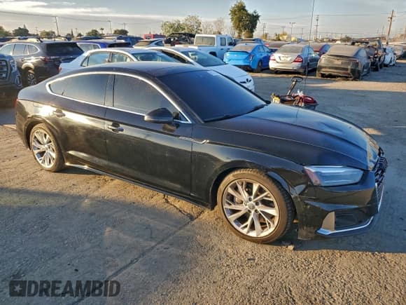 ✅ 2020 Audi A5 Sportback Premium • VIN: WAUANCF52LA004721 • Лот: 95730045. Опубликован ранее на Copart с пробегом 114 918 миль. Бесплатный доступ к архиву аукционных продаж из США и подробный отчёт об истории автомобиля на DreamBid. Изображение 4.