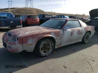 1987 Chevrolet Camaro with VIN 1G1FP21F7HL106467, listed as a Copart auction lot 85570774 with 31,252 mi miles and Salvage title. Bid and sale history available at DreamBid. Image 1.