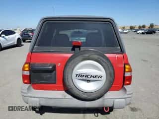 1999 Chevrolet Tracker с VIN 2CNBE18C9X6904523, выставлен на аукционе Copart как лот 67675345 с пробегом 124 806 миль миль и Чистый • Clean title. История ставок и продаж доступна на DreamBid. Изображение 6.
