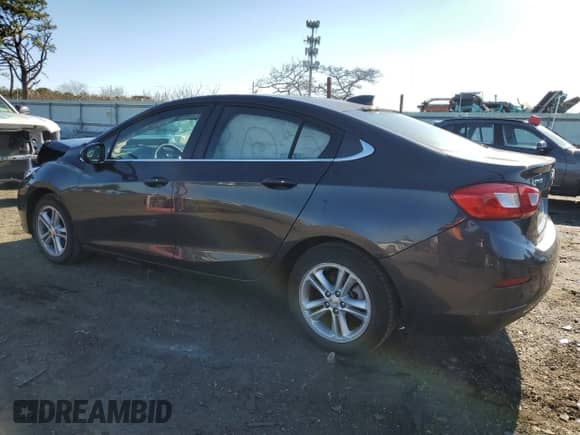 2017 Chevrolet Cruze LT z VIN 1G1BE5SM9H7234737, wystawiony jako Copart lot #69469422 z przebiegiem 41 545 mil mil oraz . Historia ofert i sprzedaży dostępna na DreamBid. Obrazek 2.