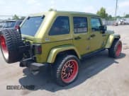 ✅ 2007 Jeep Wrangler Unlimited Sahara • VIN: 1J4GA59117L118162 • Lot: 42835652. Listed on IAAI with 199,208 mi. Free auction sales archive from the USA and detailed vehicle history report at DreamBid. Image 4.