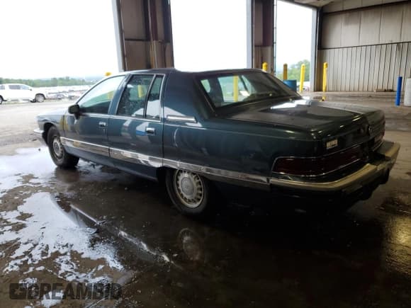 ✅ 1994 Buick Roadmaster • VIN: 1G4BN52P1RR421828 • Lot: 62710145. Listed on Copart with 130,889 mi. Free auction sales archive from the USA and detailed vehicle history report at DreamBid. Image 2.