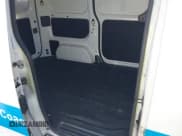 ✅ 2021 Nissan NV200 SV • VIN: 3N6CM0KN6MK693999 • Lot: 42606379. Listed on IAAI with 204,639 mi. Free auction sales archive from the USA and detailed vehicle history report at DreamBid. Image 3.