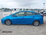 ✅ 2021 Toyota Prius L Eco • VIN: JTDKAMFUXM3141945 • Lot: 43016798. Listed on IAAI with 230,906 mi. Free auction sales archive from the USA and detailed vehicle history report at DreamBid. Image 14.