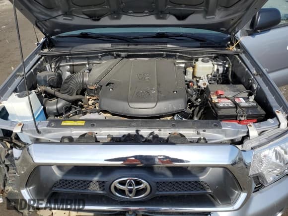 ✅ 2015 Toyota Tacoma • VIN: 3TMLU4EN0FM205580 • Lot: 85667644. Listed on Copart with 60,806 mi. Free auction sales archive from the USA and detailed vehicle history report at DreamBid. Image 11.