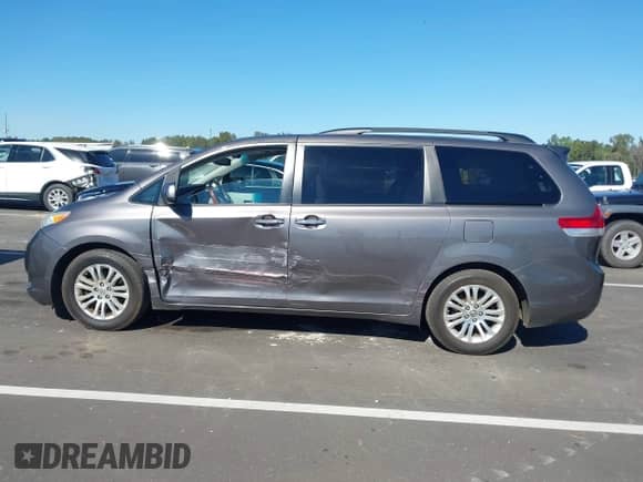 2011 Toyota Sienna XLE AAS with VIN 5TDYK3DC5BS140466, listed as a IAAI auction lot 43460456 with 135,420 mi miles and . Bid and sale history available at DreamBid. Image 14.