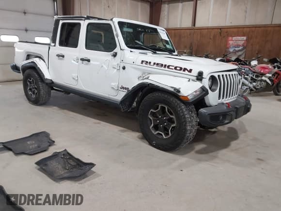 ✅ 2022 Jeep Gladiator Rubicon • VIN: 1C6JJTBG3NL160464 • Лот: 43070209. Опубликован ранее на IAAI с пробегом 52 184 миль. Бесплатный доступ к архиву аукционных продаж из США и подробный отчёт об истории автомобиля на DreamBid. Изображение 1.