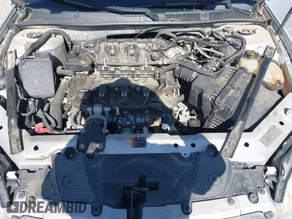 2013 Chevrolet Impala LS z VIN 2G1WF5E35D1265220, wystawiony jako IAAI lot #42559869 z przebiegiem 124 046 mil mil oraz . Historia ofert i sprzedaży dostępna na DreamBid. Obrazek 10.