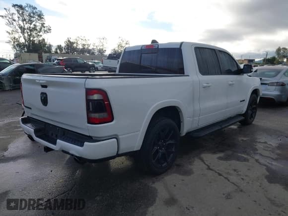 ✅ 2022 Ram 1500 Laramie • VIN: 1C6RREJM5NN276798 • Lot: 43688940. Listed on IAAI with 64,582 mi. Free auction sales archive from the USA and detailed vehicle history report at DreamBid. Image 4.