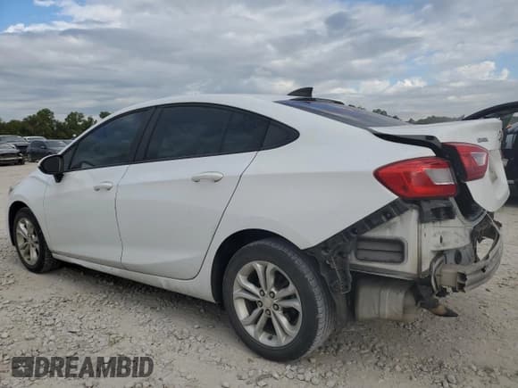 ✅ 2019 Chevrolet Cruze LS • VIN: 1G1BC5SMXK7102289 • Lot: 86277365. Listed on Copart with 145,500 mi. Free auction sales archive from the USA and detailed vehicle history report at DreamBid. Image 2.