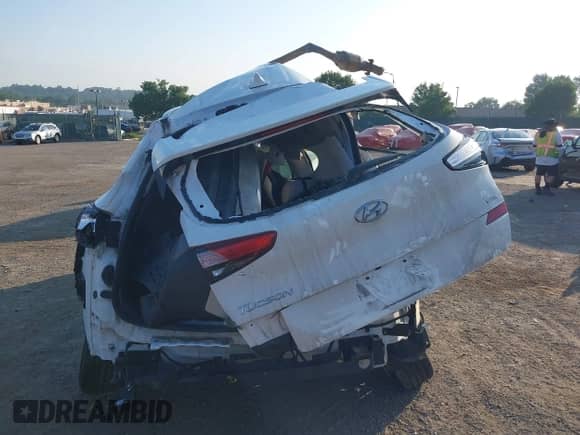 2020 Hyundai Tucson SEL with VIN KM8J3CAL9LU144547, listed as a IAAI auction lot 42869898 with Not provided miles and . Bid and sale history available at DreamBid. Image 16.