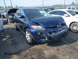 ✅ 2010 Mazda CX-7 Touring • VIN: JM3ER2W30A0327029 • Lot: 42155700. Listed on IAAI with 86,124 mi. Free auction sales archive from the USA and detailed vehicle history report at DreamBid. Image 1.