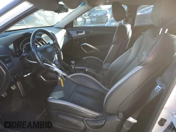 ✅ 2014 Hyundai Veloster Turbo • VIN: KMHTC6AE2EU197623 • Lot: 80214114. Wystawiony na Copart z przebiegiem 18 466 mil. Bezpłatny archiwum sprzedaży aukcyjnych z USA i szczegółowy raport historii pojazdu na DreamBid. Zdjęcie 7.