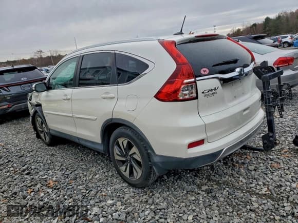 ✅ 2015 Honda CR-V Touring • VIN: 5J6RM4H91FL124933 • Лот: 94083665. Опубликован ранее на Copart с пробегом 81 639 миль. Бесплатный доступ к архиву аукционных продаж из США и подробный отчёт об истории автомобиля на DreamBid. Изображение 2.