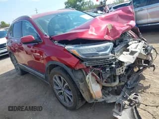 ✅ 2021 Honda CR-V Touring • VIN: 2HKRW2H99MH636154 • Lot: 43336982. Listed on IAAI with 68,032 mi. Free auction sales archive from the USA and detailed vehicle history report at DreamBid. Image 1.