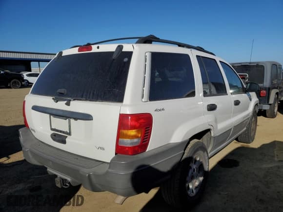 ✅ 1999 Jeep Grand Cherokee Laredo • VIN: 1J4GW58N8XC736438 • Лот: 88605625. Опубликован ранее на Copart с пробегом 181 612 миль. Бесплатный доступ к архиву аукционных продаж из США и подробный отчёт об истории автомобиля на DreamBid. Изображение 3.