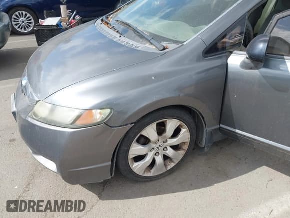 ✅ 2011 Honda Civic DX-VP • VIN: 19XFA1F35BE014906 • Lot: 43373293. Listed on IAAI with 219,413 mi. Free auction sales archive from the USA and detailed vehicle history report at DreamBid. Image 12.