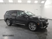 ✅ 2025 Cadillac XT6 AWD Premium Luxury • VIN: 1GYKPDRS2SZ119323 • Lot: 90238605. Listed on Copart with 13,649 mi. Free auction sales archive from the USA and detailed vehicle history report at DreamBid. Image 4.