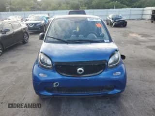 ✅ 2016 Smart fortwo Passion • VIN: WMEFJ5DA0GK076339 • Лот: 68891564. Опубликован ранее на Copart с пробегом Не указан. Бесплатный доступ к архиву аукционных продаж из США и подробный отчёт об истории автомобиля на DreamBid. Изображение 5.
