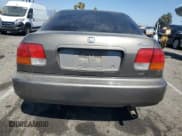 ✅ 1998 Honda Civic DX • VIN: JHMEJ6621WS000759 • Lot: 68038975. Wystawiony na Copart z przebiegiem 162 913 mil. Bezpłatny archiwum sprzedaży aukcyjnych z USA i szczegółowy raport historii pojazdu na DreamBid. Zdjęcie 6.