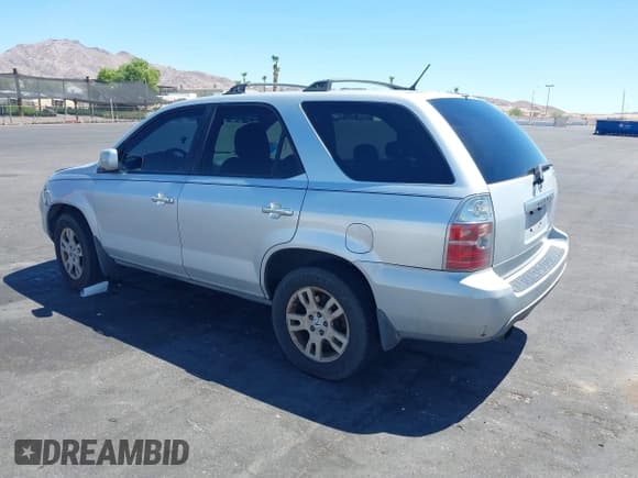 ✅ 2004 Acura MDX Touring • VIN: 2HNYD18874H546989 • Lot: 42872728. Wystawiony na IAAI z przebiegiem 254 810 mil. Bezpłatny archiwum sprzedaży aukcyjnych z USA i szczegółowy raport historii pojazdu na DreamBid. Zdjęcie 3.