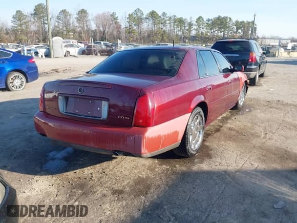 ✅ 2001 Cadillac DeVille DTS • VIN: 1G6KF57931U282835 • Lot: 41780555. Listed on IAAI with Not provided. Free auction sales archive from the USA and detailed vehicle history report at DreamBid. Image 4.