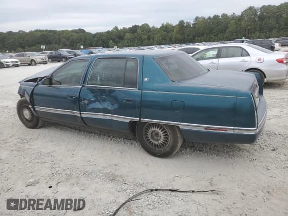 ✅ 1994 Cadillac DeVille • VIN: 1G6KD52B7RU282512 • Lot: 71072114. Listed on Copart with 179,919 mi. Free auction sales archive from the USA and detailed vehicle history report at DreamBid. Image 2.