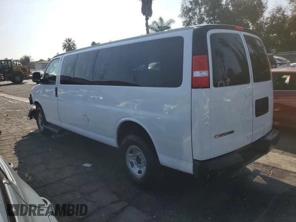 ✅ 2023 Chevrolet Express Passenger LS • VIN: 1GAZGNFP3P1234182 • Lot: 90387125. Listed on Copart with 36,837 mi. Free auction sales archive from the USA and detailed vehicle history report at DreamBid. Image 2.
