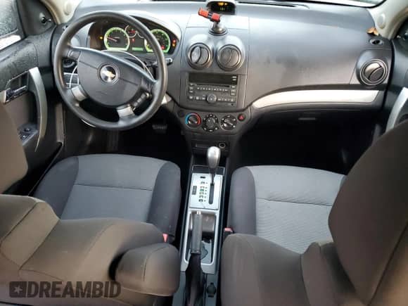 2009 Chevrolet Aveo 1LT с VIN KL1TD66EX9B659123, выставлен на аукционе Copart как лот 85975904 с пробегом 163 357 миль миль и Списание • Salvage title. История ставок и продаж доступна на DreamBid. Изображение 8.