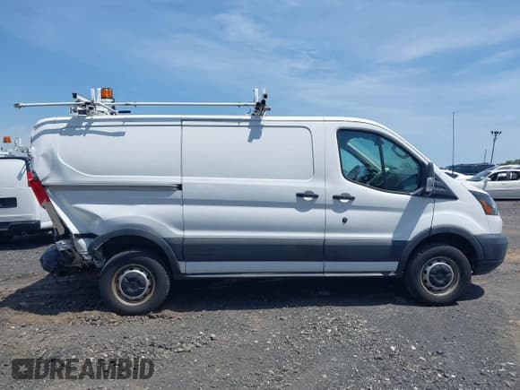 ✅ 2016 Ford Transit Cargo • VIN: 1FTYR1YM0GKB55605 • Lot: 42211489. Listed on IAAI with Not provided. Free auction sales archive from the USA and detailed vehicle history report at DreamBid. Image 13.