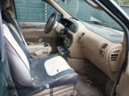 ✅ 1998 Chrysler Town & Country LXi • VIN: 1C4GP64L9WB665462 • Lot: 42705332. Wystawiony na IAAI z przebiegiem 179 000 mil. Bezpłatny archiwum sprzedaży aukcyjnych z USA i szczegółowy raport historii pojazdu na DreamBid. Zdjęcie 5.