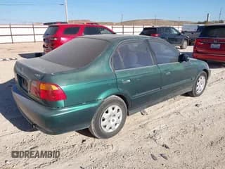 ✅ 1999 Honda Civic VP • VIN: 2HGEJ6618XH519357 • Lot: 43674167. Listed on IAAI with 196,865 mi. Free auction sales archive from the USA and detailed vehicle history report at DreamBid. Image 4.