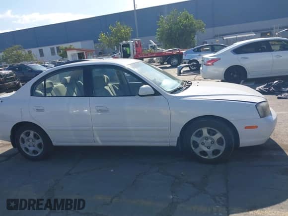 2003 Hyundai Elantra GLS with VIN KMHDN45D13U567025, listed as a IAAI auction lot 43400927 with 123,580 mi miles and . Bid and sale history available at DreamBid. Image 13.