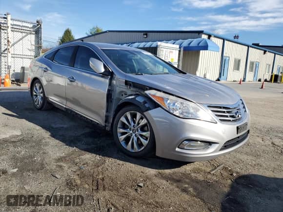 2013 Hyundai Azera с VIN KMHFG4JGXDA240841, выставлен на аукционе Copart как лот 82084474 с пробегом 168 746 миль миль и Списание • Salvage title. История ставок и продаж доступна на DreamBid. Изображение 4.