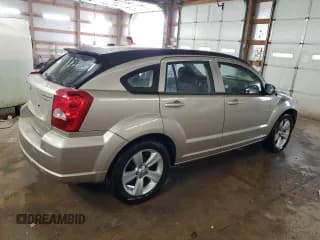 ✅ 2010 Dodge Caliber Mainstreet • VIN: 1B3CB3HAXAD627936 • Лот: 81231994. Опубликован ранее на Copart с пробегом 118 279 миль. Бесплатный доступ к архиву аукционных продаж из США и подробный отчёт об истории автомобиля на DreamBid. Изображение 3.