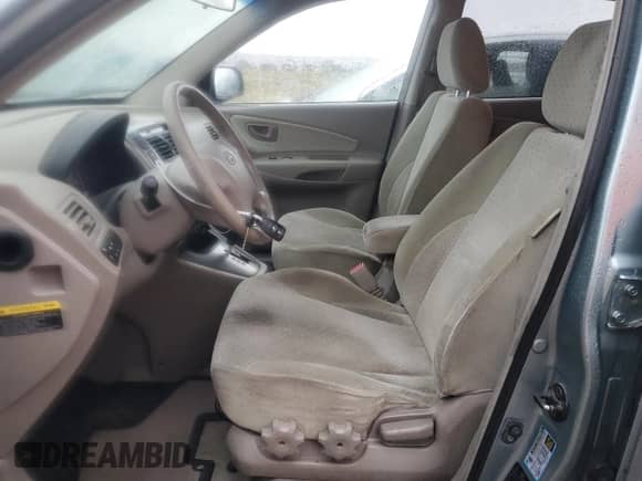 2005 Hyundai Tucson GLS z VIN KM8JN72DX5U214908, wystawiony jako Copart lot #76346024 z przebiegiem 152 677 mil mil oraz Szkoda całkowita • Salvage title. Historia ofert i sprzedaży dostępna na DreamBid. Obrazek 7.