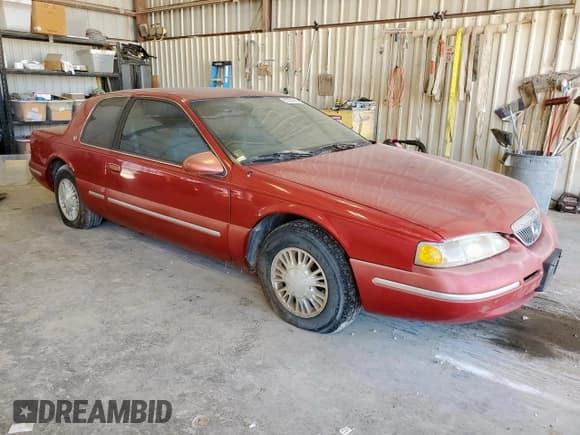 ✅ 1996 Mercury Cougar • VIN: 1MELM6245TH628645 • Лот: 62226955. Опубликован ранее на Copart с пробегом 165 952 миль. Бесплатный доступ к архиву аукционных продаж из США и подробный отчёт об истории автомобиля на DreamBid. Изображение 4.
