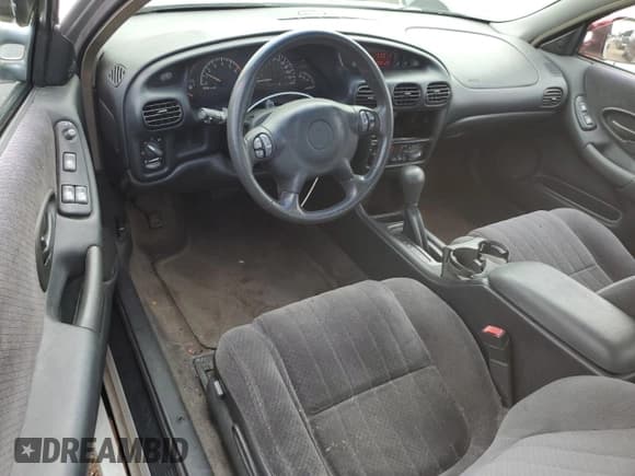 ✅ 2002 Pontiac Grand Prix GT • VIN: 1G2WP12KX2F230739 • Лот: 81589685. Опубликован ранее на Copart с пробегом 233 532 миль. Бесплатный доступ к архиву аукционных продаж из США и подробный отчёт об истории автомобиля на DreamBid. Изображение 8.