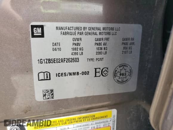 2010 Chevrolet Malibu 1LS z VIN 1G1ZB5E02AF262603, wystawiony jako Copart lot #57138915 z przebiegiem 128 992 mil mil oraz Szkoda całkowita • Salvage title. Historia ofert i sprzedaży dostępna na DreamBid. Obrazek 13.