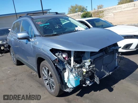 ✅ 2022 Toyota Corolla Cross XLE • VIN: 7MUDAABG2NV026091 • Lot: 43565474. Listed on IAAI with 33,524 mi. Free auction sales archive from the USA and detailed vehicle history report at DreamBid. Image 1.