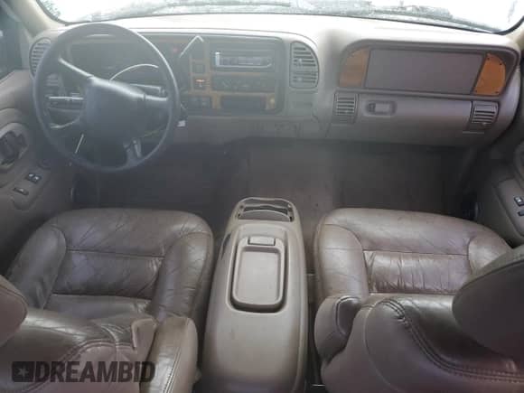 1999 Chevrolet Silverado 1500 with VIN 1GCEK19R2XR116510, listed as a Copart auction lot 50011045 with 174,401 mi miles and Salvage title. Bid and sale history available at DreamBid. Image 8.