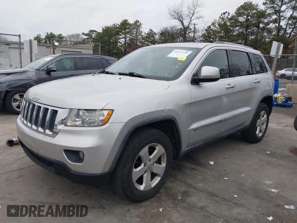 ✅ 2011 Jeep Grand Cherokee Laredo • VIN: 1J4RR4GG4BC671187 • Lot: 43777735. Listed on IAAI with 115,785 mi. Free auction sales archive from the USA and detailed vehicle history report at DreamBid. Image 2.